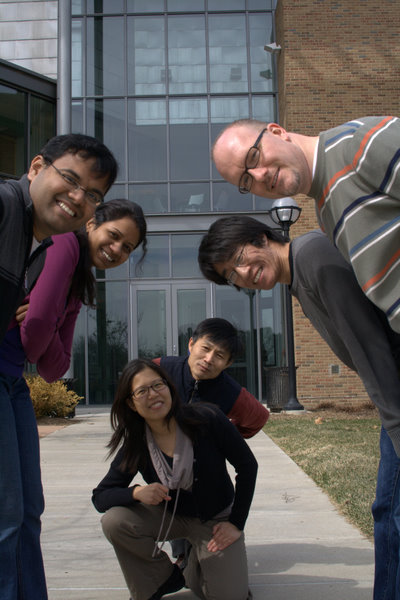 Sept lab students and Prof. Sept posed outside BME building